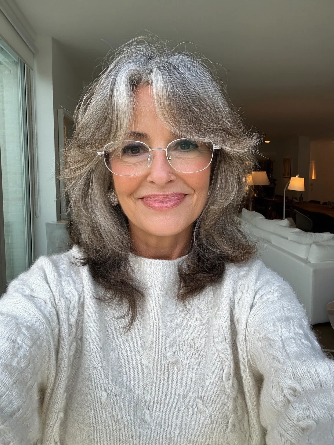 Shoulder-Length Wavy Layers with Curtain Bangs